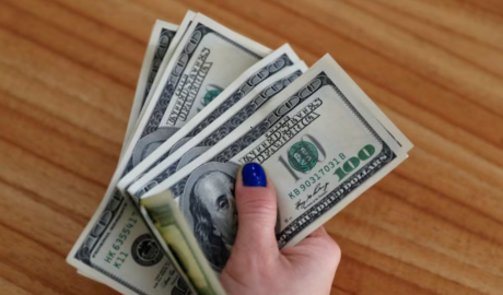 dólares per cápita Argentina